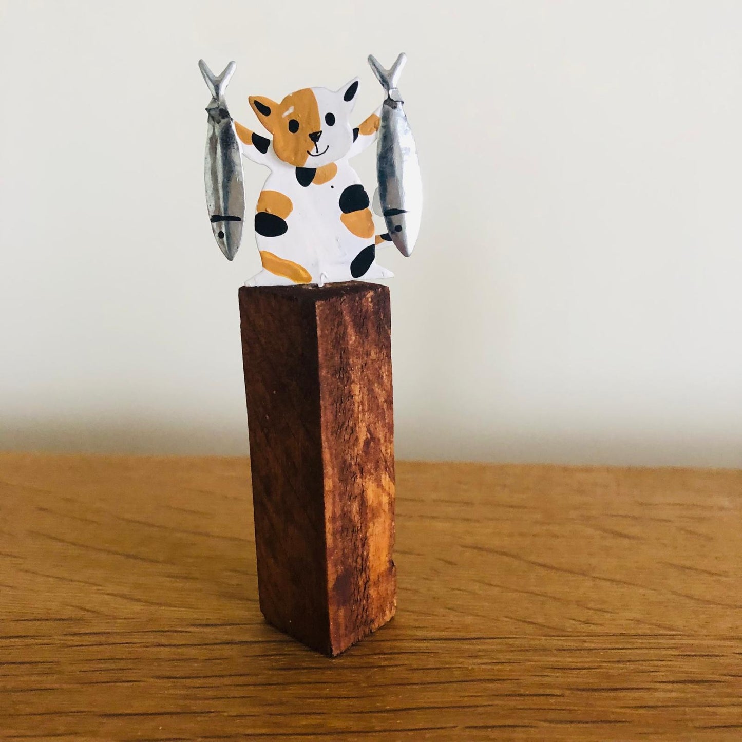 Cats with Fish on Plinths - ad&i