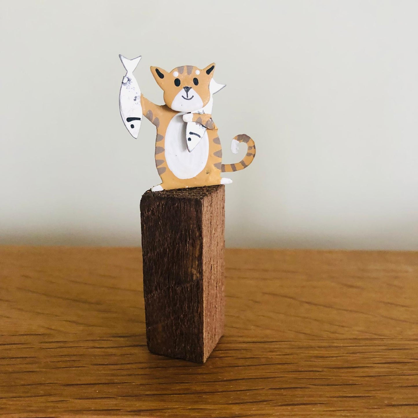 Cats with Fish on Plinths - ad&i