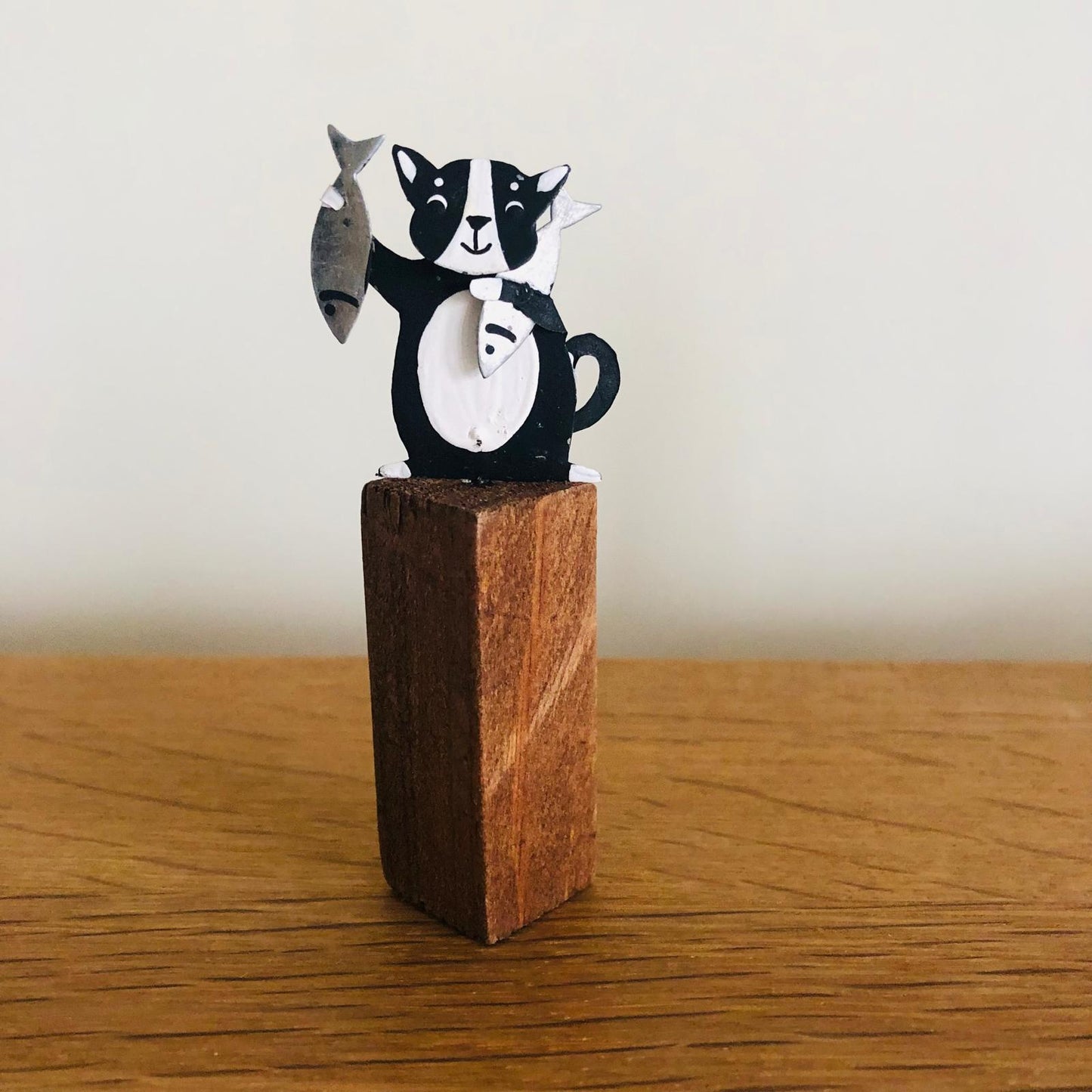 Cats with Fish on Plinths - ad&i