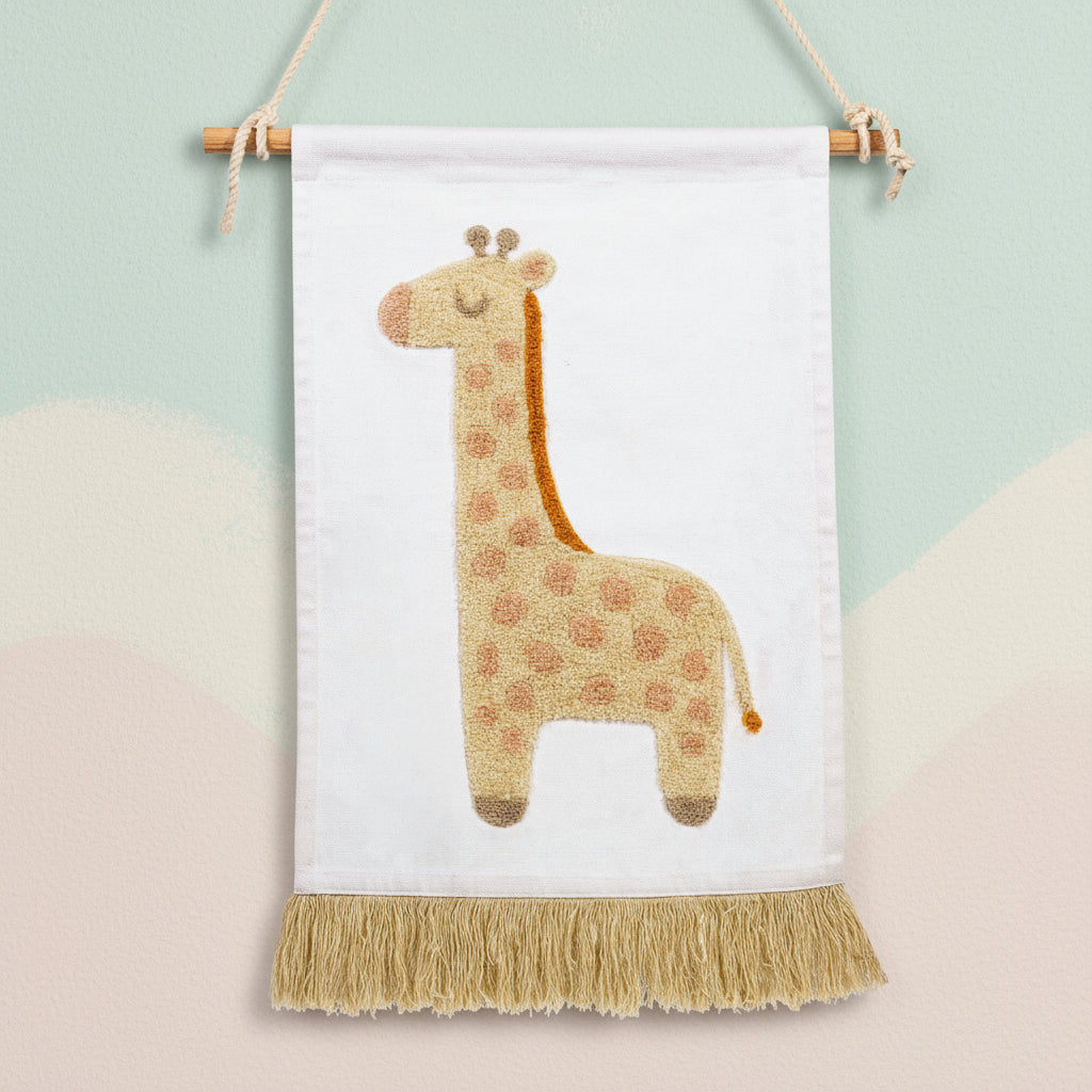 Decorative wall hanging with a giraffe design on a white background