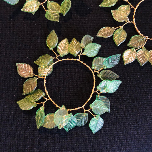 Decorative leaf wreath on a black background