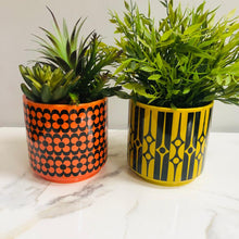 Load image into Gallery viewer, Magpie x Hornsea Repeat Flower Orange Medium Plant Pot - ad&amp;i