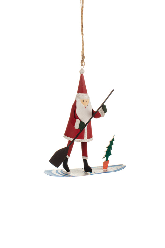Decorative ornament of Santa Claus skiing with christmas tree, hanging from a string